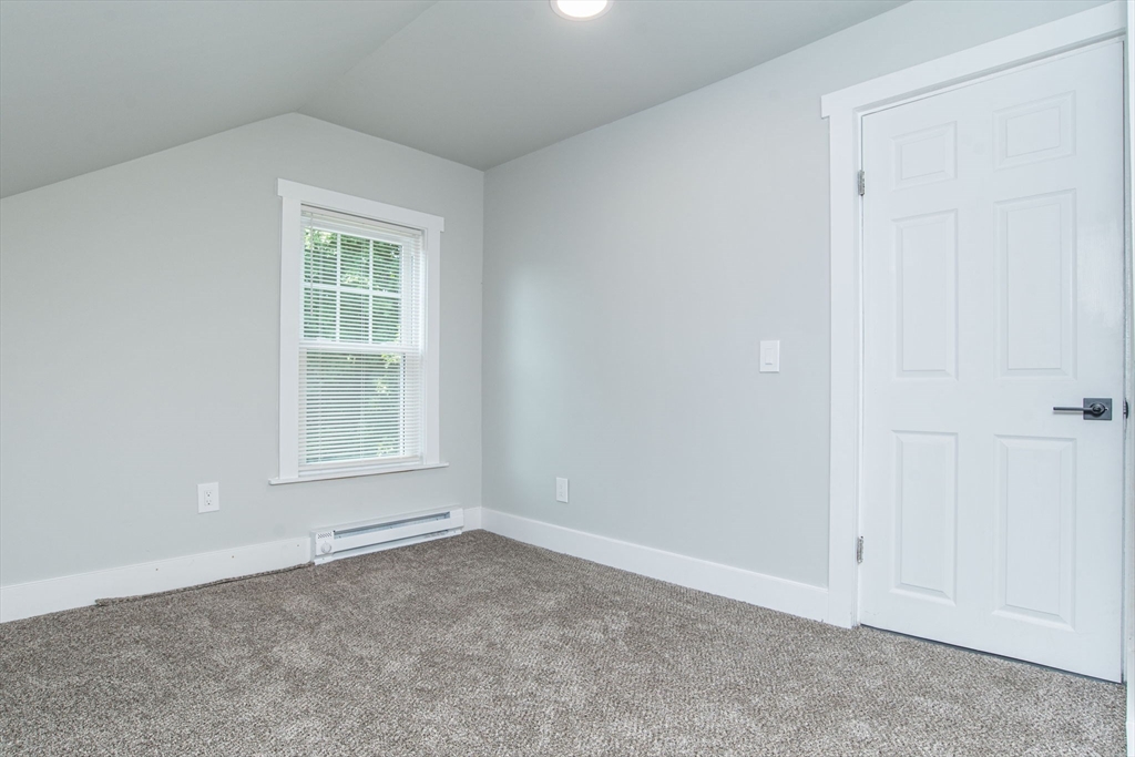 260 High Street Cumberland, RI 02864 - Photo 28 of 42 an empty room with windows