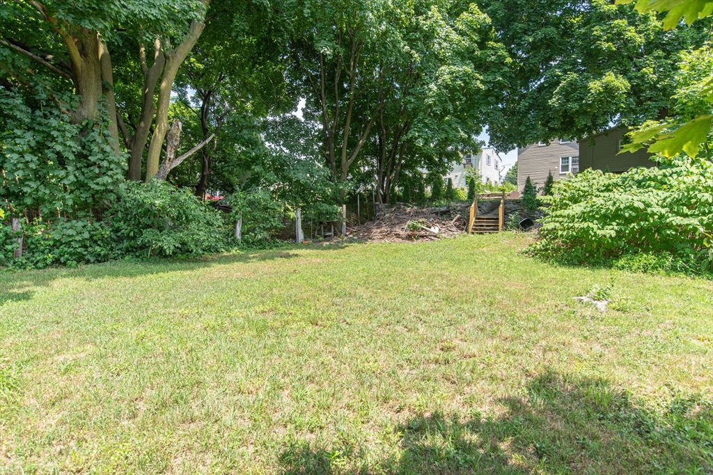 260 High Street Cumberland, RI 02864 - Photo 39 of 42 a view of a garden with trees