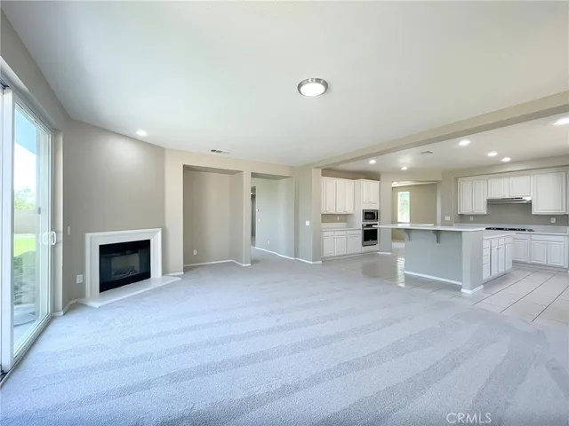 a view of a livingroom with a fireplace