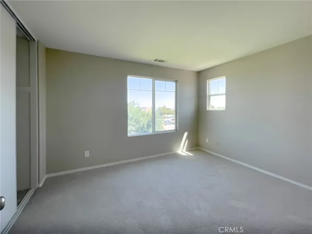 an empty room with a bathroom