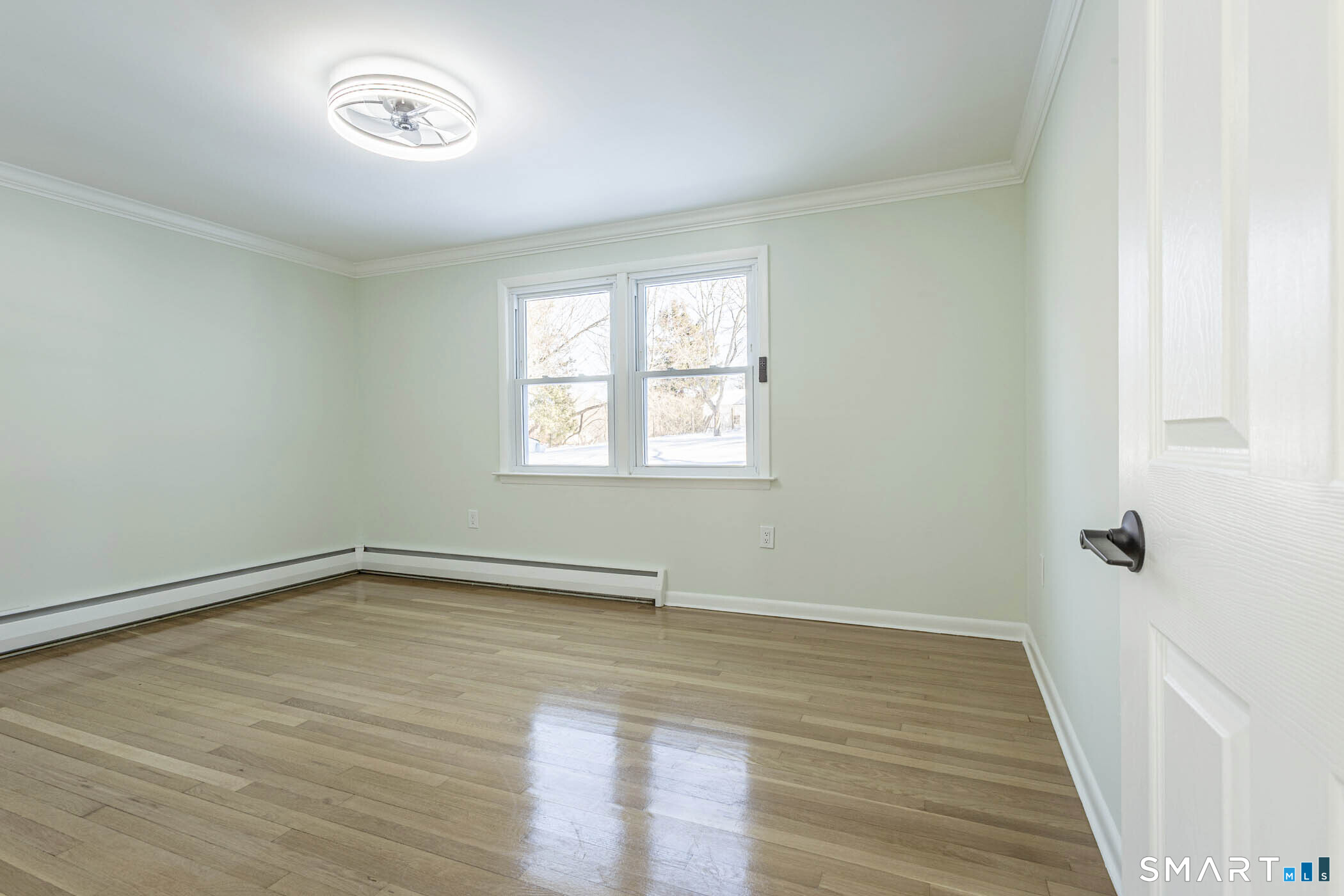 26 Kelly Road Hamden, CT 06518 - Photo 20 of 37 wooden floor in an empty room with a window