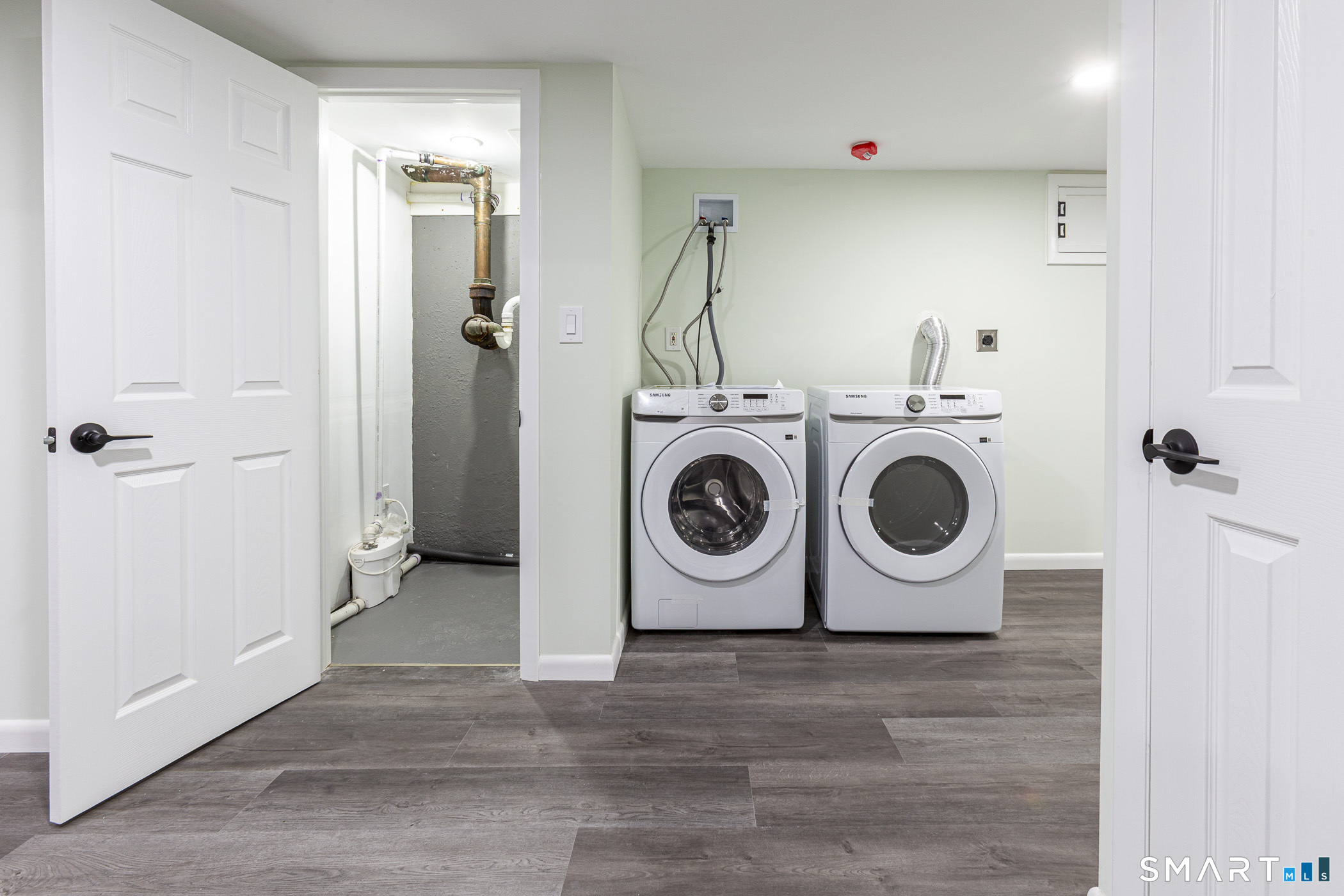 26 Kelly Road Hamden, CT 06518 - Photo 28 of 37 a utility room with dryer and washer