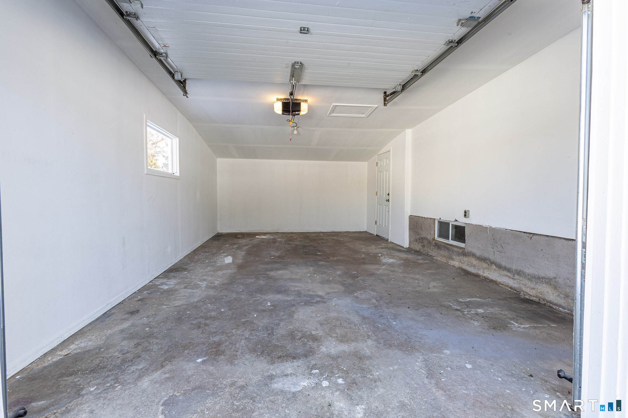 26 Kelly Road Hamden, CT 06518 - Photo 29 of 37 a view of a hallway with a window