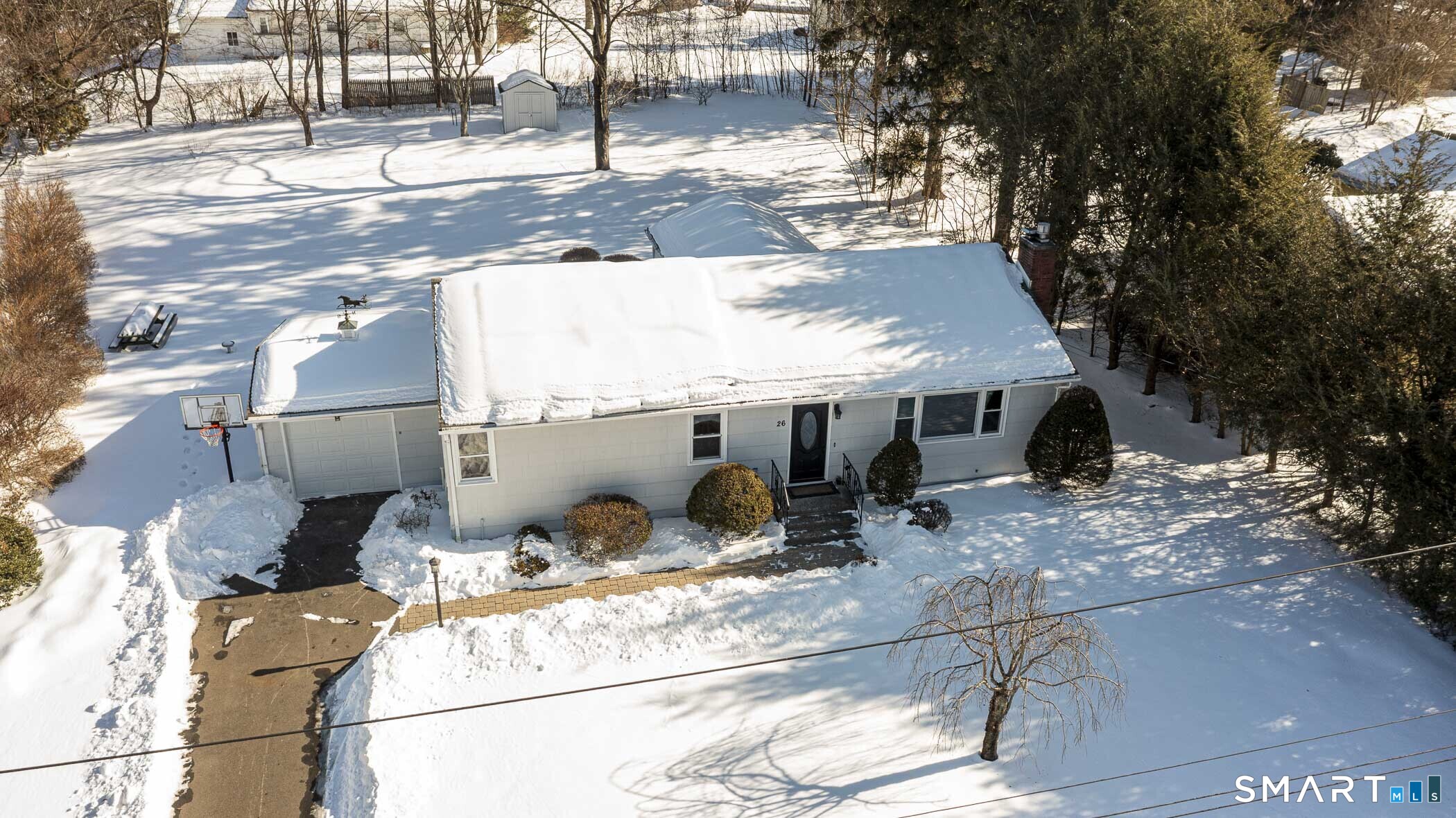 26 Kelly Road Hamden, CT 06518 - Photo 31 of 37 a view of a house with a patio