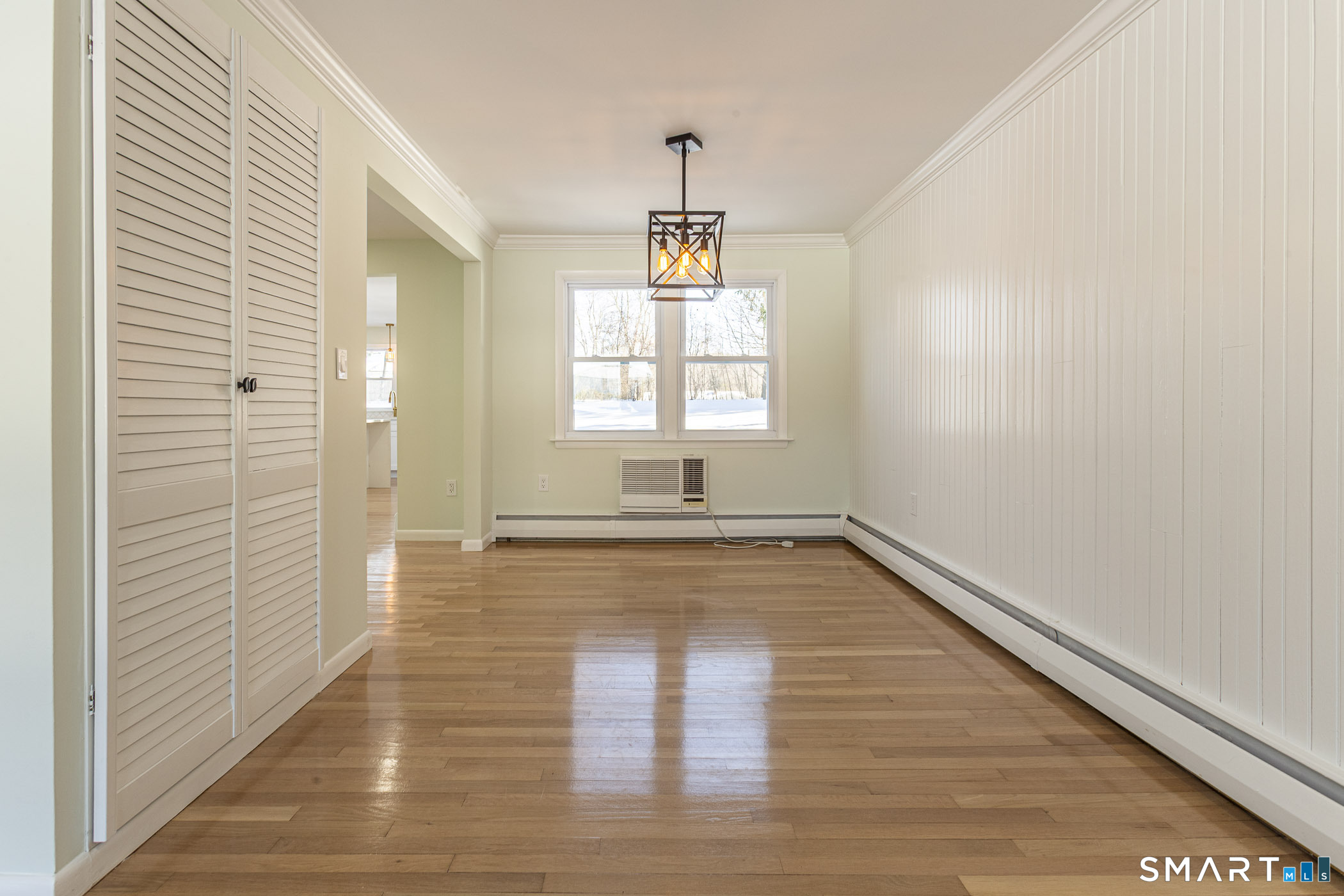 26 Kelly Road Hamden, CT 06518 - Photo 10 of 37 a view of empty room with wooden floor and fan