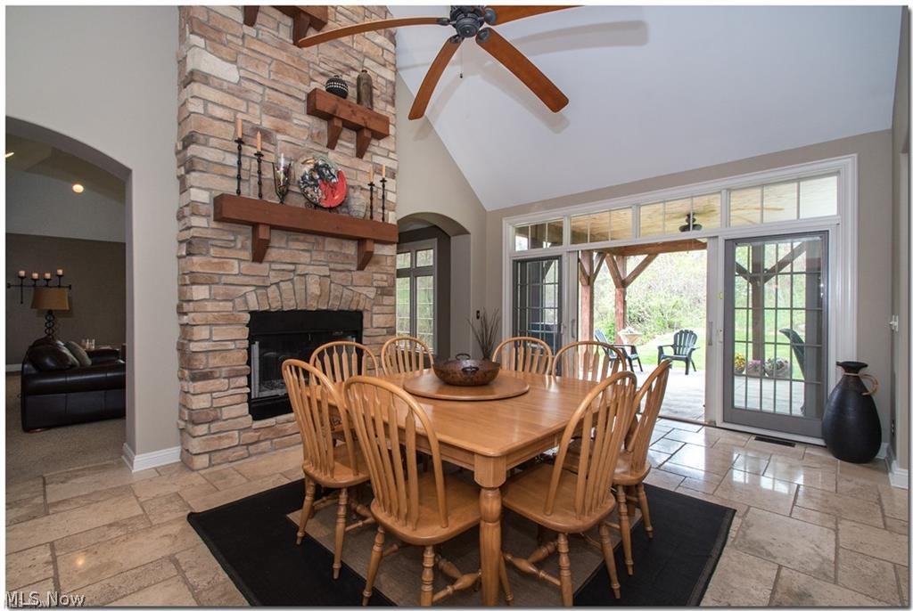 12430 Falcon Ridge Road Chesterland, OH 44026 - Photo 7 of 28 View of this magnificent stone fireplace!
Travertine tile is half-inch think! This home is
built with high-end quality windows, doors,
flooring, insulation and more!
