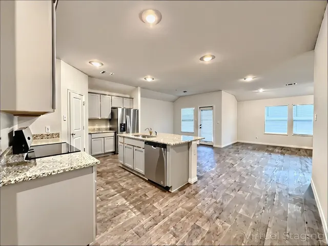 a large kitchen with cabinets