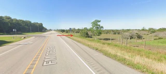 a view of swimming pool from a balcony