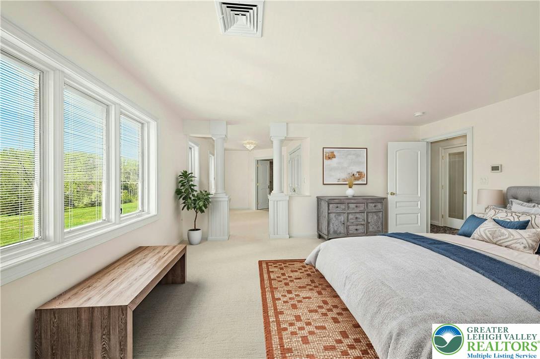 3200 Creamery Road New Hope, PA 18938 - Photo 32 of 42 a bedroom with a large bed and a couch