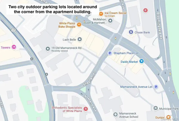 a picture of a book and a white bed