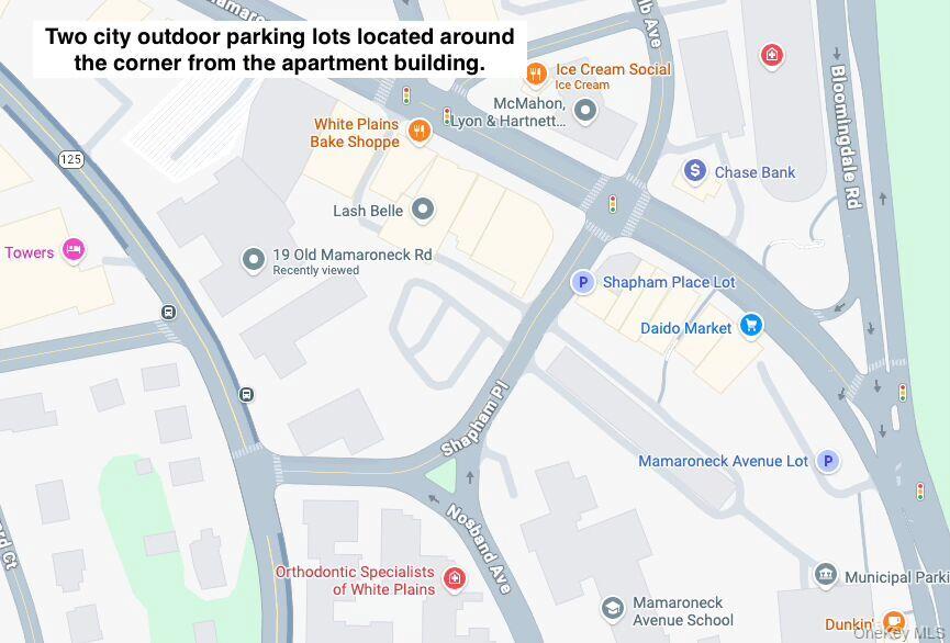 19 Old Mamaroneck Road, Unit 2J White Plains, NY 10605 - Photo 13 of 14 a picture of a book and a white bed