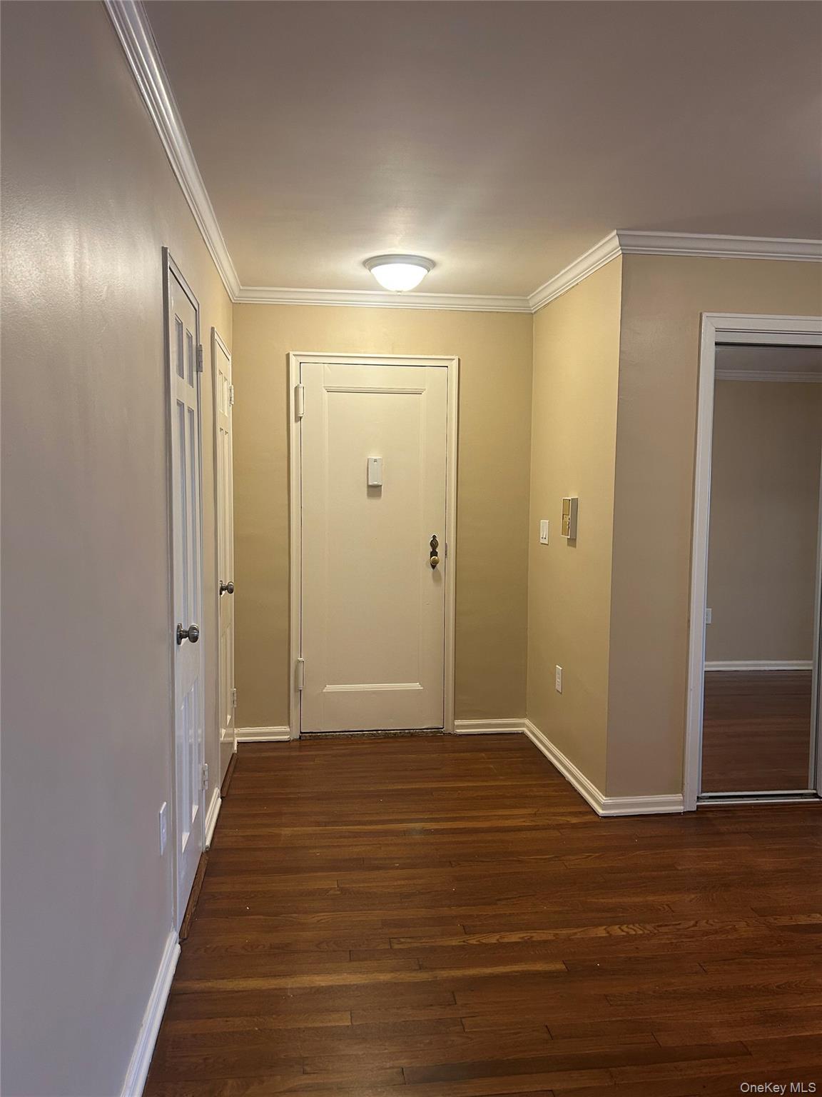 19 Old Mamaroneck Road, Unit 2J White Plains, NY 10605 - Photo 2 of 14 a view of hallway with wooden floor
