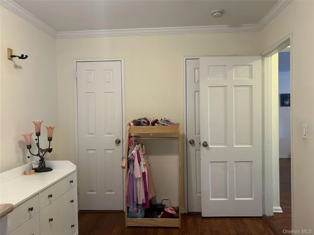 a view of a hallway with closet