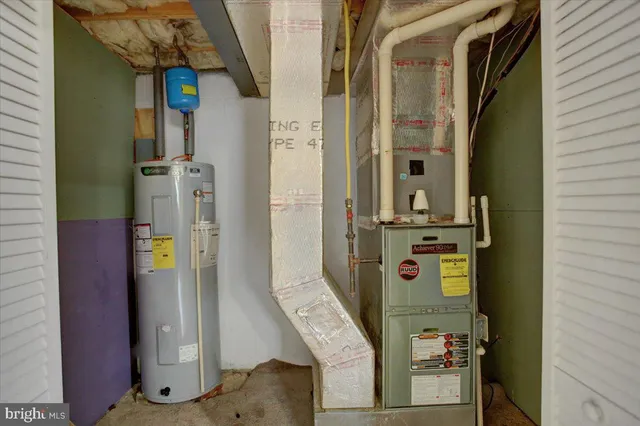 a view of an empty room and a window