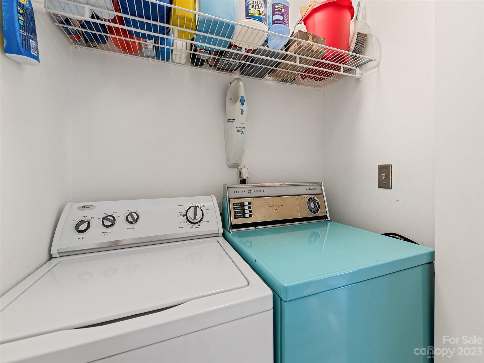 87 Willow Road, Unit C1 Waynesville, NC 28786 - Photo 21 of 48 a utility room with dryer and washer