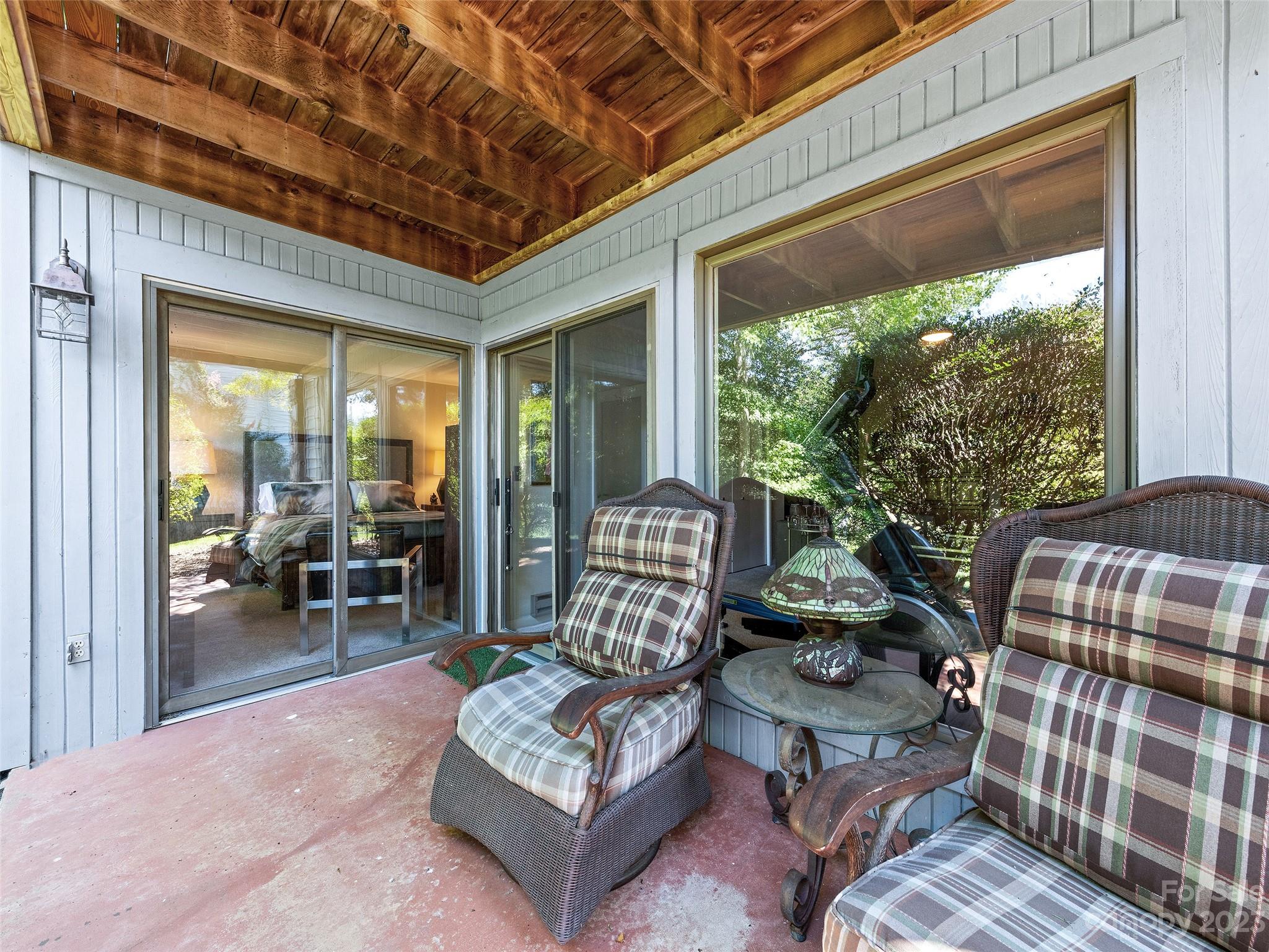 87 Willow Road, Unit C1 Waynesville, NC 28786 - Photo 26 of 48 a living room with furniture and a large window