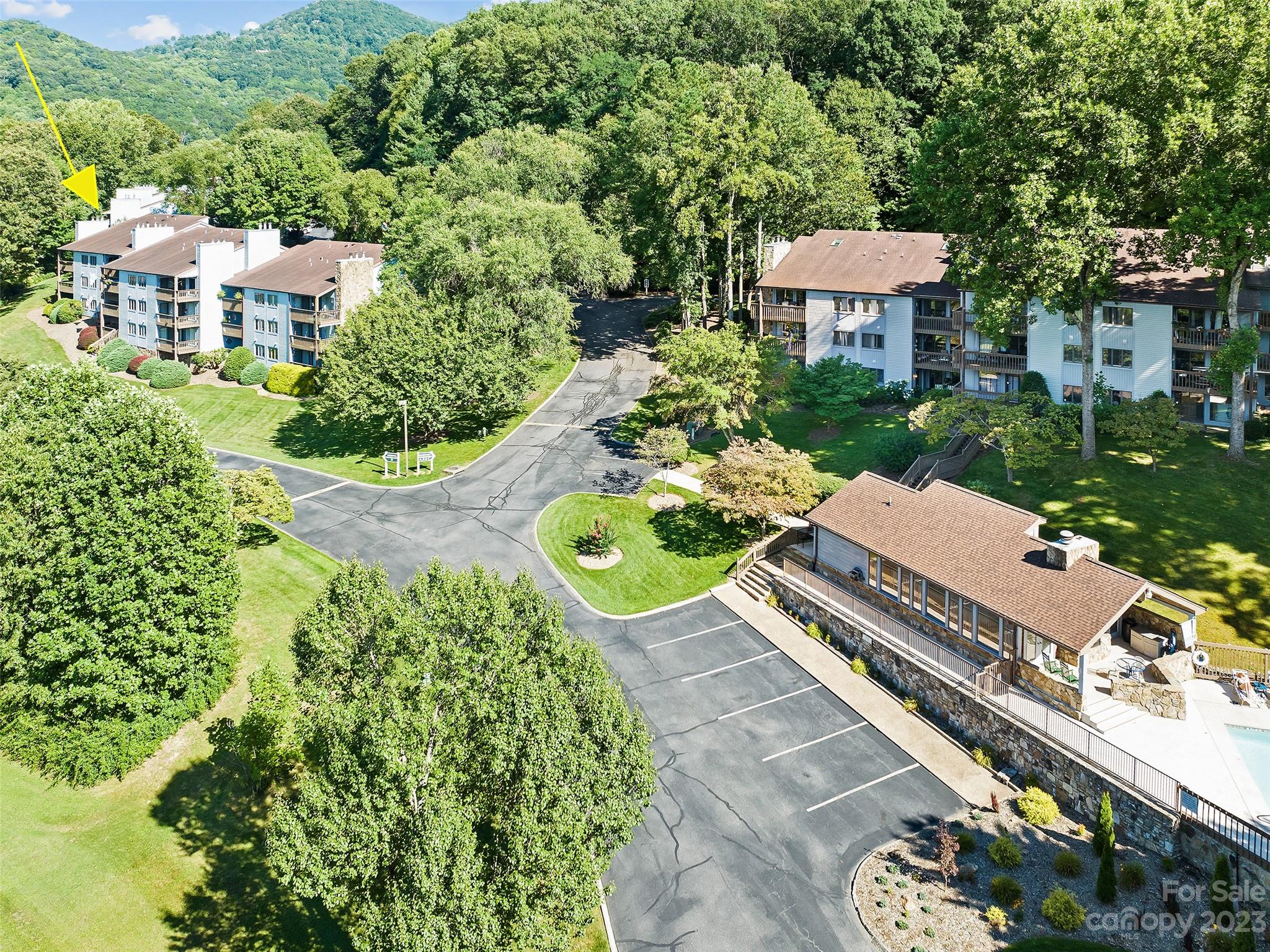 87 Willow Road, Unit C1 Waynesville, NC 28786 - Photo 39 of 48 an aerial view of a house with a garden