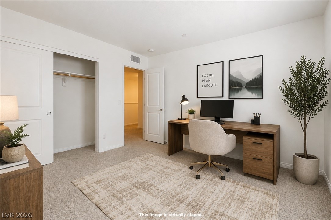 12369 Golden Wreath Road, Unit 2 Las Vegas, NV 89183 - Photo 14 of 19 A quiet room provides an ideal setting for a productive home office or a peaceful retreat.