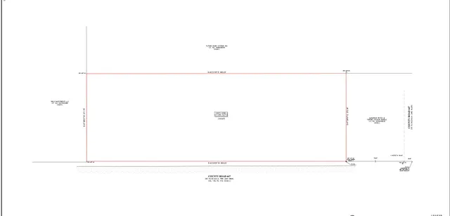 a view of a yard with trees