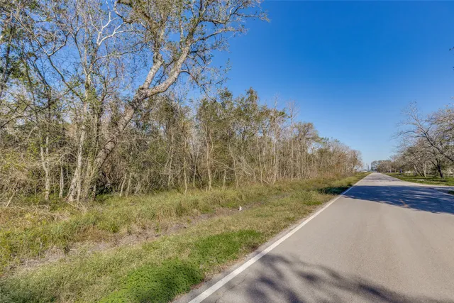 a view of swimming pool with a yard