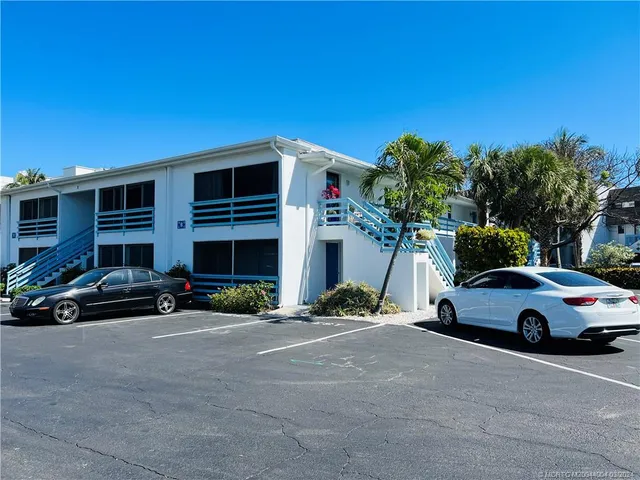 a car parked in front of a house