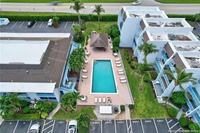 a view of a house with swimming pool