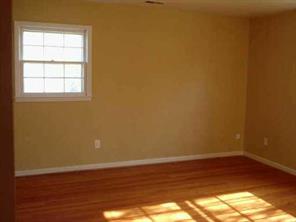 5928 Powder Horn Road Charlotte, NC 28212 - Photo 6 of 7 a view of a small space with wooden floor and a window