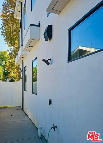 a bathroom with a sink vanity and a mirror