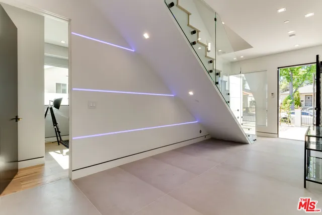 a view of a livingroom with wooden floor