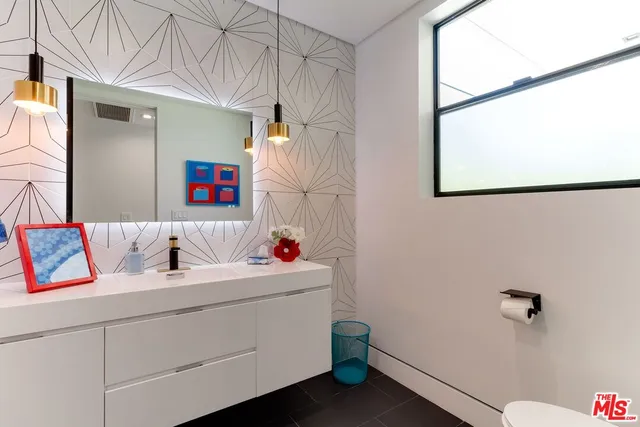 a room with furniture and a rug