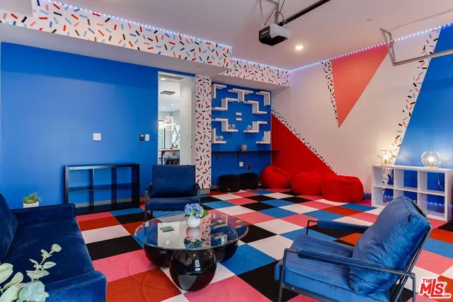 a room with musical instruments and air hockey table