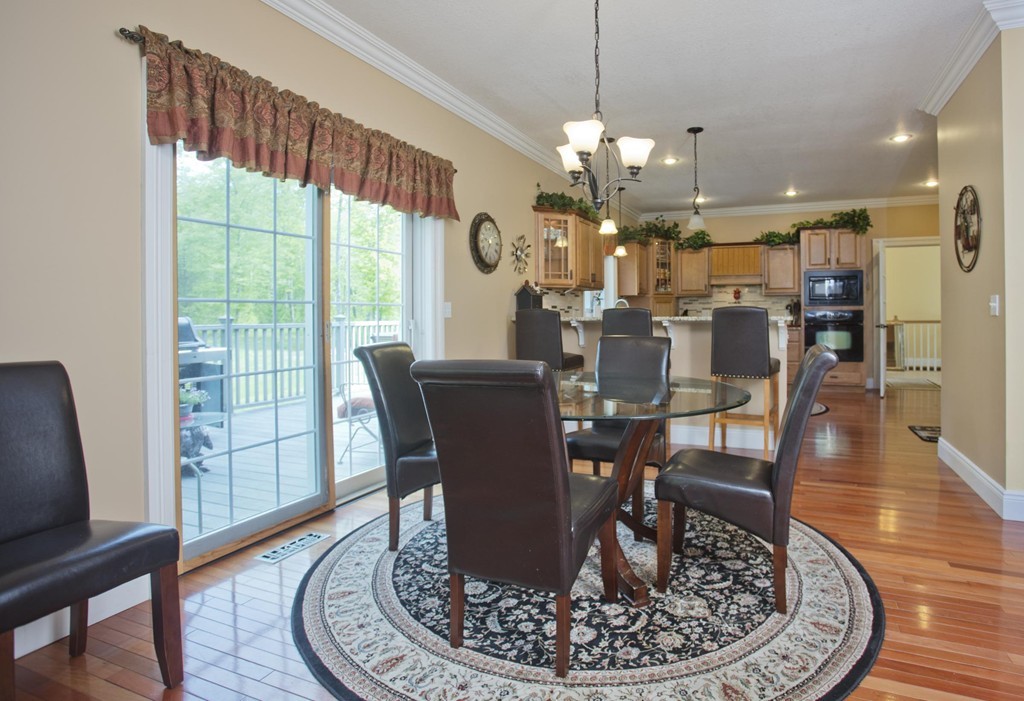 676 Old Warren Road Palmer, MA 01069 - Photo 14 of 30 a view of a dining room with furniture window and wooden floor