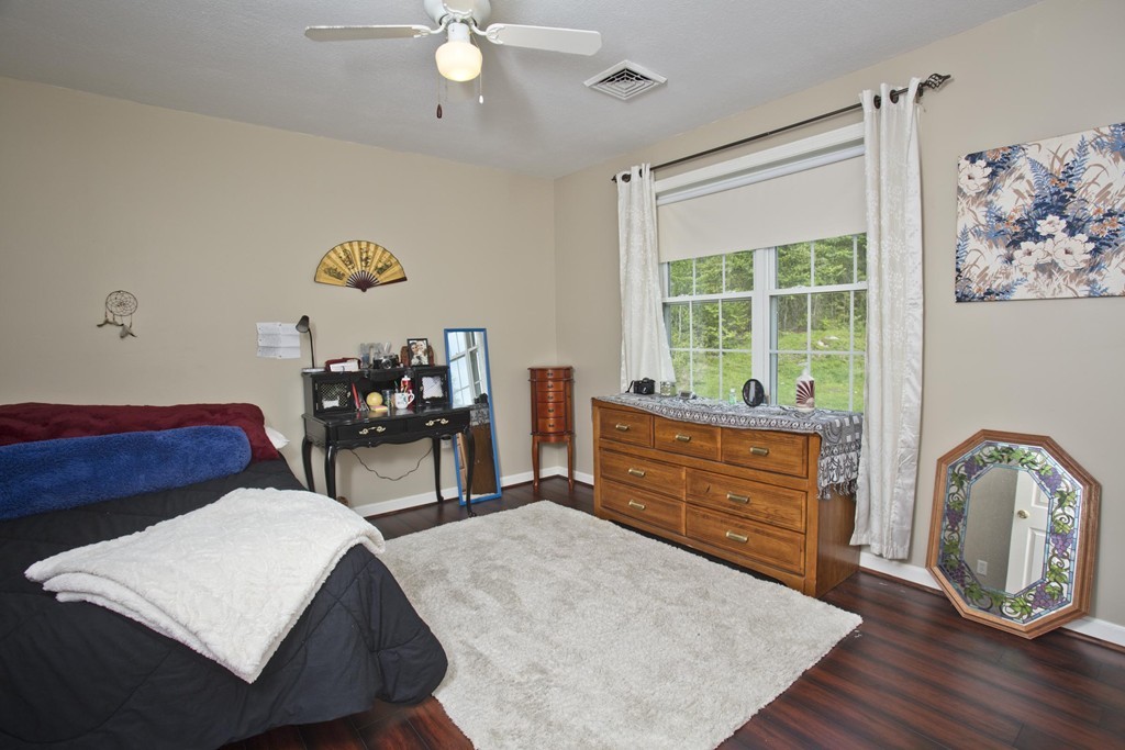 676 Old Warren Road Palmer, MA 01069 - Photo 23 of 30 a living room with furniture and a window