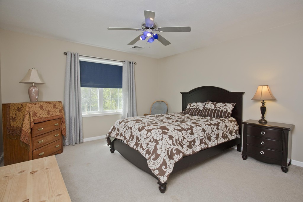 676 Old Warren Road Palmer, MA 01069 - Photo 25 of 30 a bedroom with a bed and a window