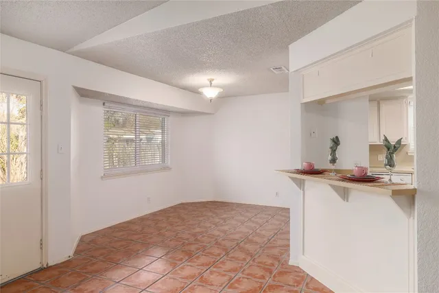 a view of a kitchen from a windows