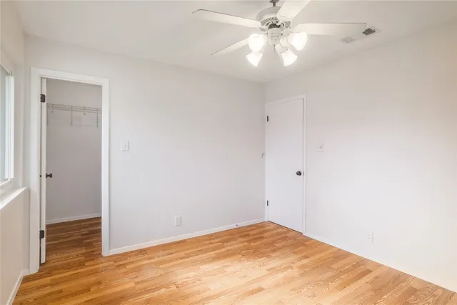 a view of a big room with carpet