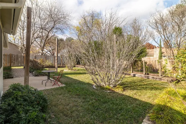 a view of a backyard with a garden