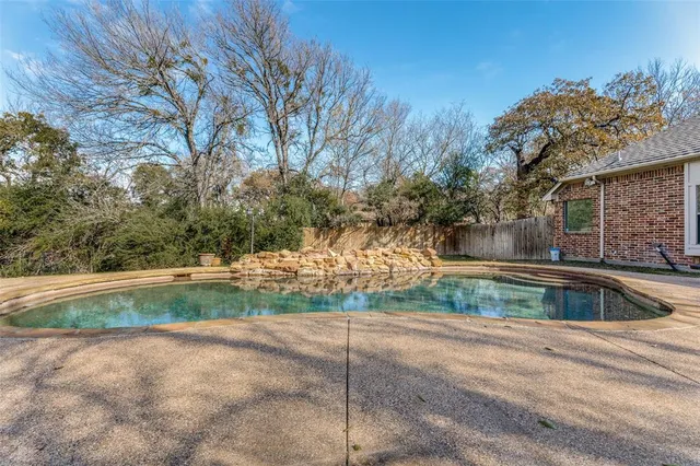 a view of backyard with green space