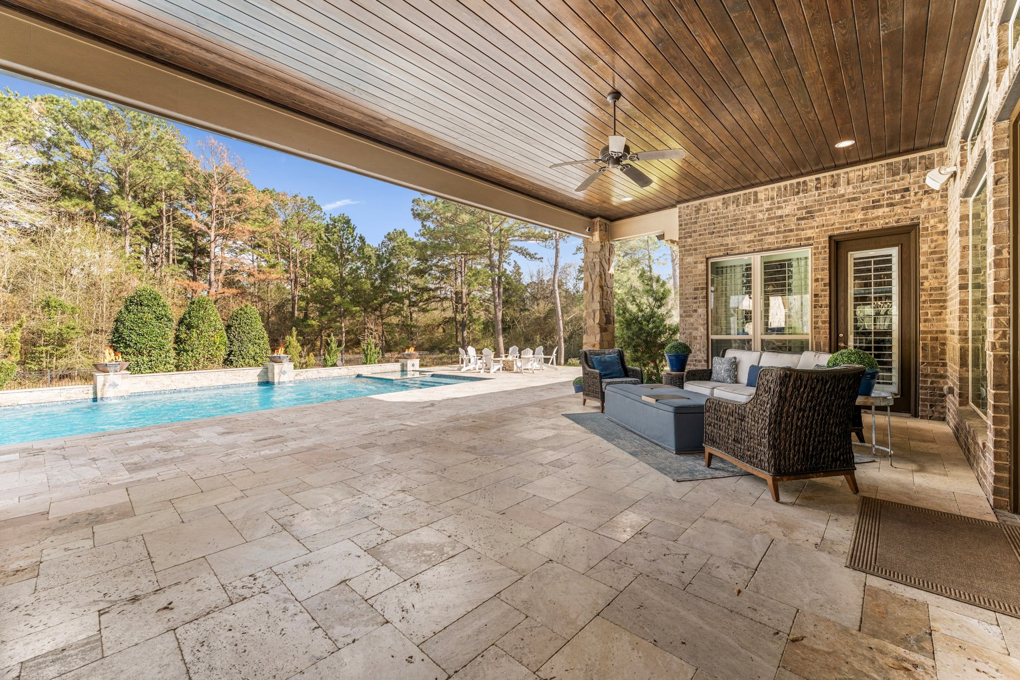 30618 Spring Lake Boulevard Tomball, TX 77375 - Photo 36 of 50 Travertine flooring for the outside covered back porch areas.