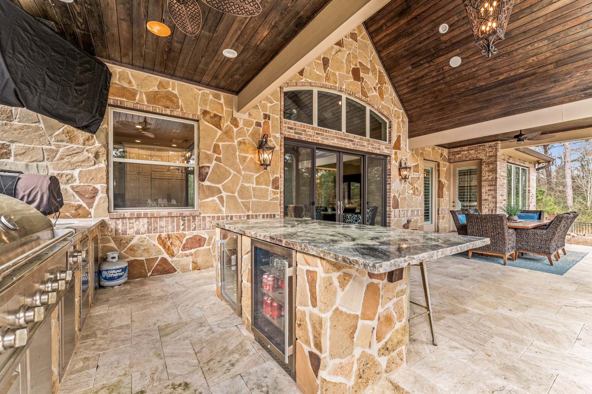 30618 Spring Lake Boulevard Tomball, TX 77375 - Photo 37 of 50 Incredible outdoor kitchen area, notice the tongue and groove ceilings. Gorgeous!