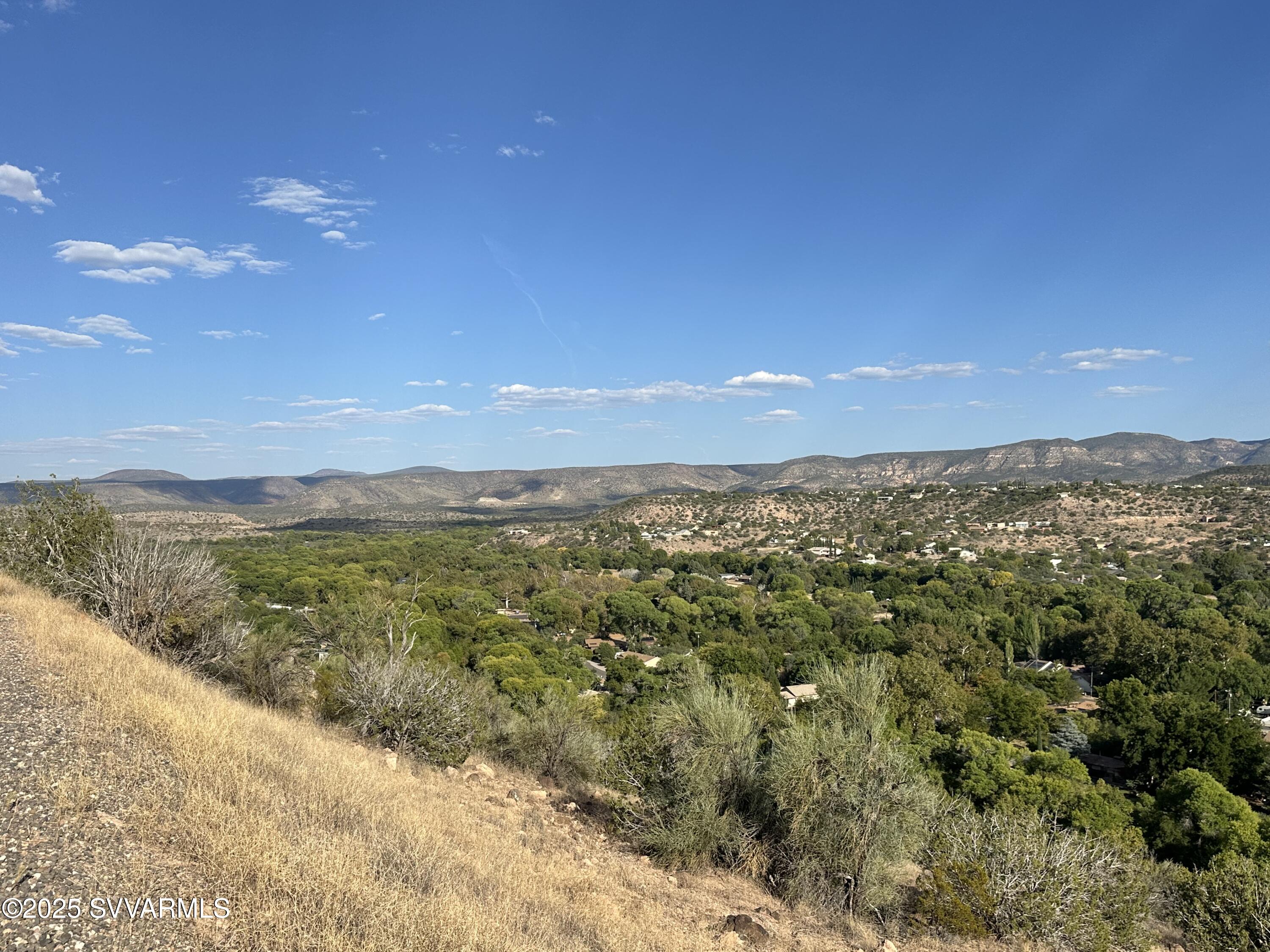 4770 Thunderhead Trail, Unit 228 Rimrock, AZ 86335 - Photo 24 of 29 a view of a city with mountains in the background