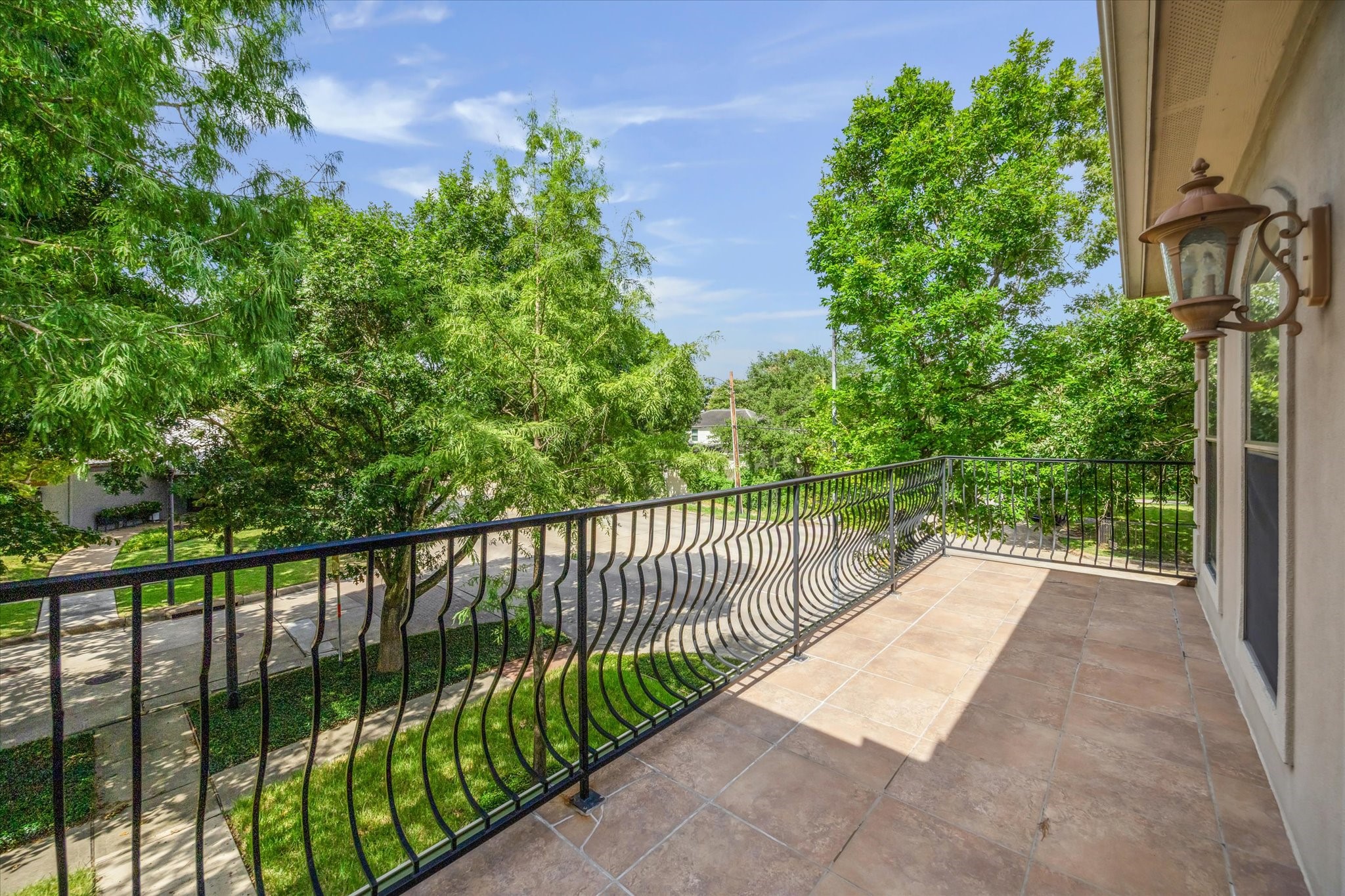 2601 Talbott Street Houston, TX 77005 - Photo 19 of 25 Spacious outdoor balcony overlooking the beautiful tree lined street.