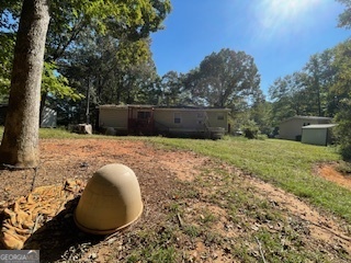 128 West Lakeview Drive Temple, GA 30179 - Photo 17 of 20 a view of a backyard