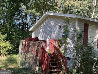 128 West Lakeview Drive Temple, GA 30179 - Photo 3 of 20 a backyard of a house with lots of green space