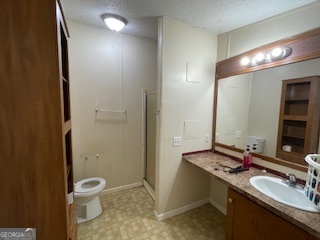 128 West Lakeview Drive Temple, GA 30179 - Photo 10 of 20 a bathroom with a sink toilet and shower