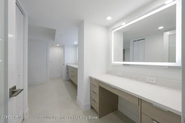 a view of an empty room with windows