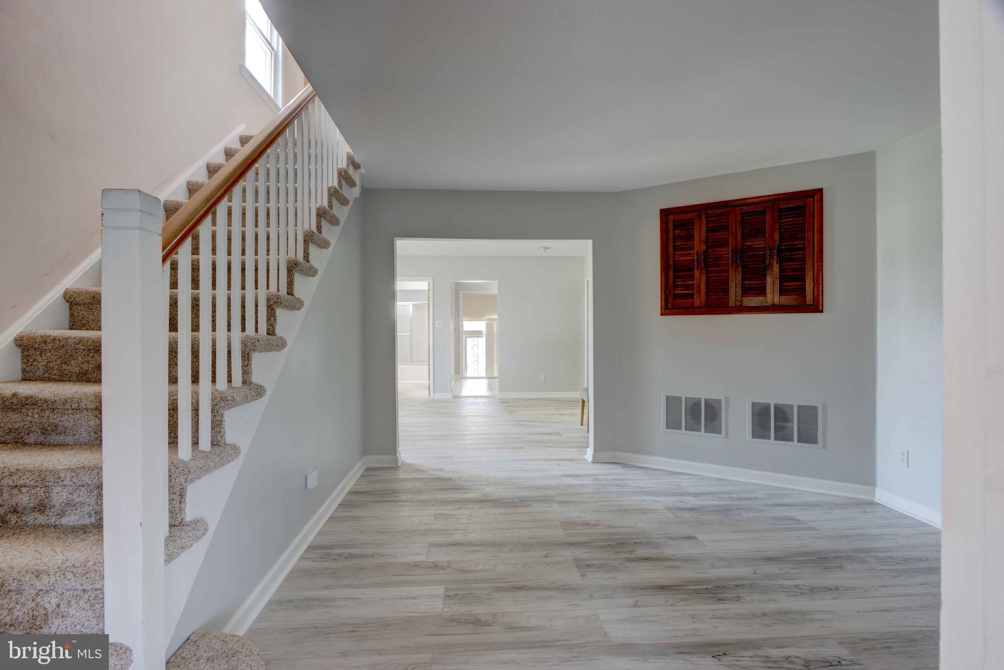 625 Hammonds Lane Baltimore, MD 21225 - Photo 15 of 40 a view of an entryway with wooden floor