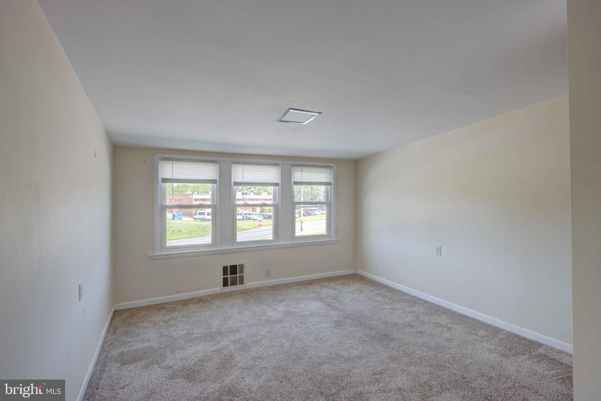 625 Hammonds Lane Baltimore, MD 21225 - Photo 25 of 40 an empty room with windows