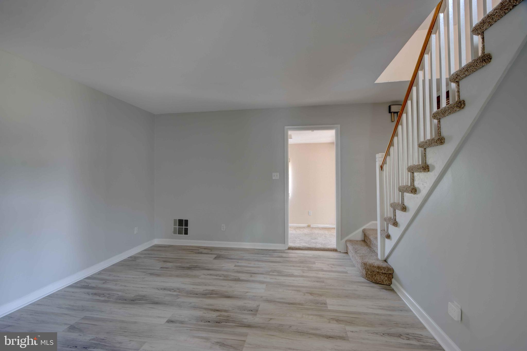 625 Hammonds Lane Baltimore, MD 21225 - Photo 10 of 40 a view of entryway with wooden floor