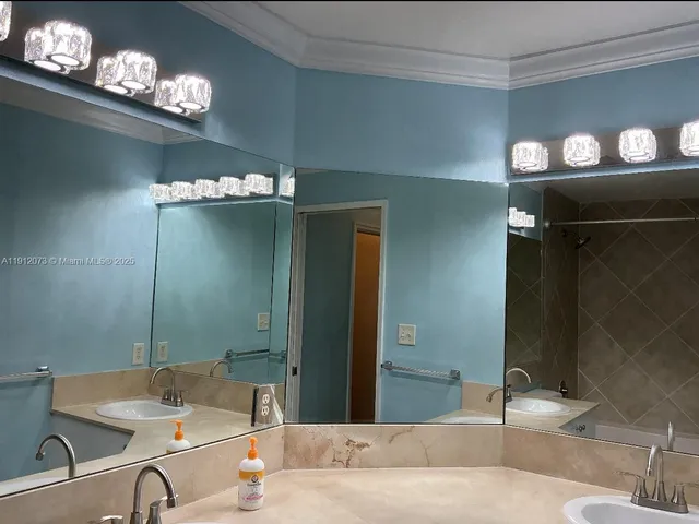 a bathroom with a toilet and a sink